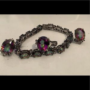Woman’s ring earrings and bracelet mystic topaz